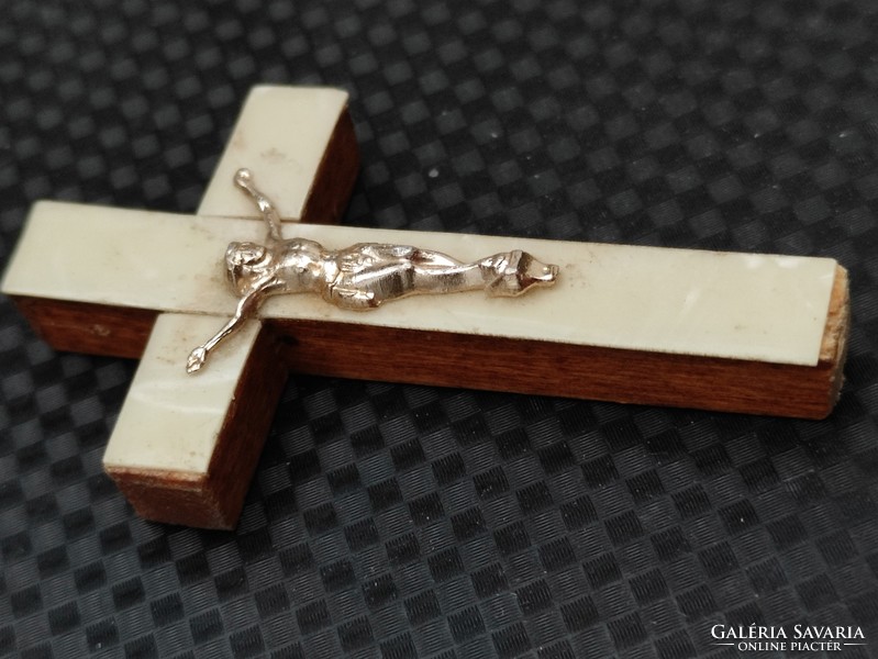 Gold colored metal Jesus crucifix with shells on wooden cross