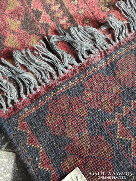Piros tónusú kézi szövésű afgán gyapjú szőnyeg kb. 60 éves
