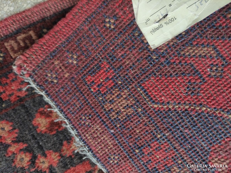 Piros tónusú kézi szövésű afgán gyapjú szőnyeg kb. 80 éves