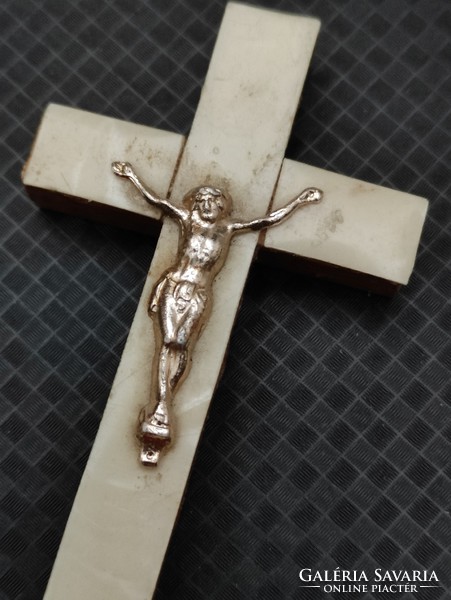 Gold colored metal Jesus crucifix with shells on wooden cross