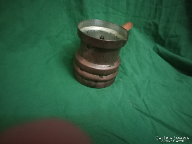 Copper spout with wooden handle from the 1960s
