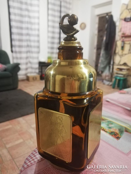 Glass bottle with copper decoration