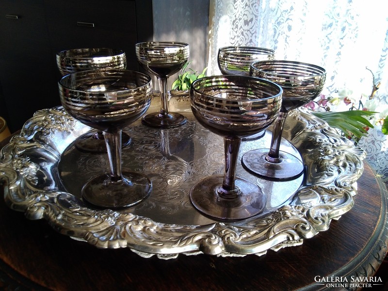 Liqueur-snaps smoky glass glasses with silver stripes running around.