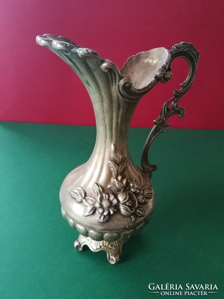 Tin decanter with wonderful shape and decoration.