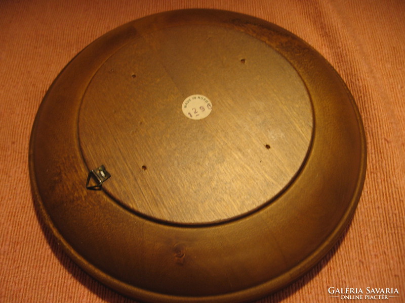 Norwegian old wall ornament on wooden plate, bowl