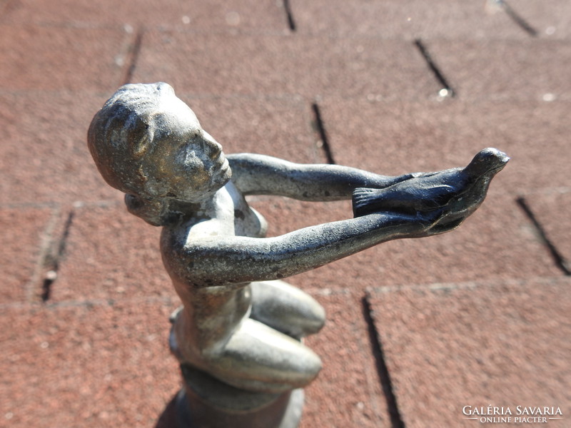 Woman with pigeon - small sculpture