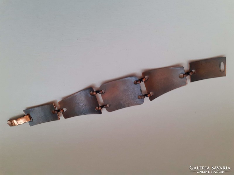 Old custom bronze handmade bracelet in a bracelet box