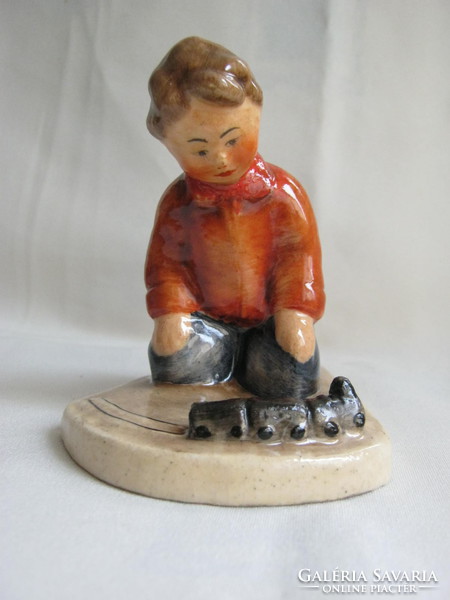 Bereznay w. Little boy playing with Vilma ceramic train