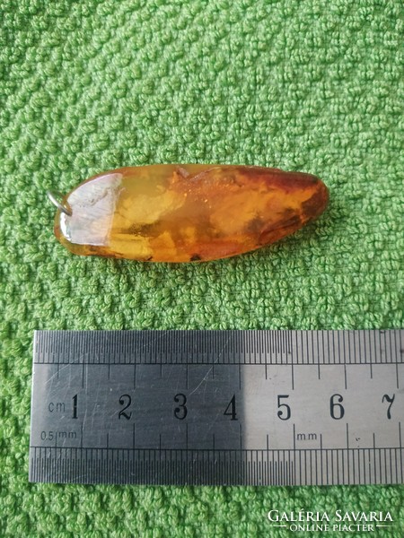 Old amber pendant
