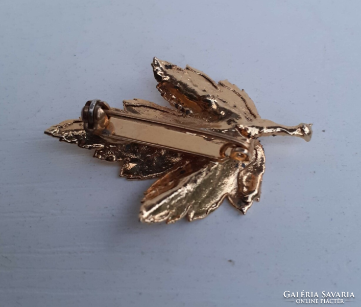 Beautiful condition gilded leaf brooch adorned with small white stones