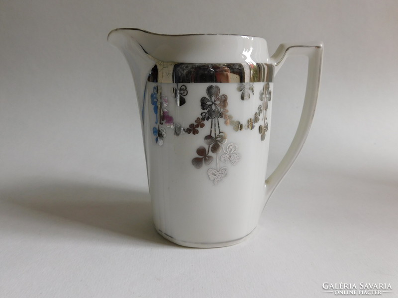 Art Nouveau milk spout with silver clover pattern