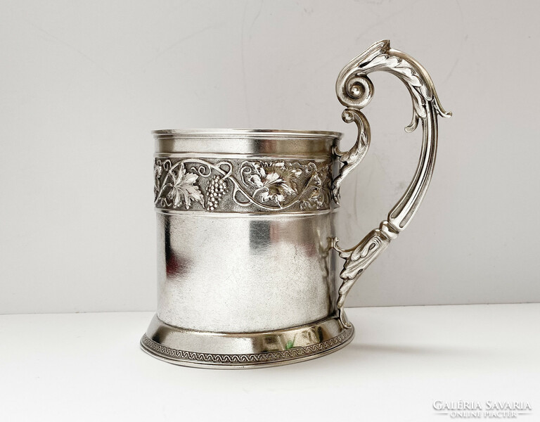 Ornate Russian silver tea cup.