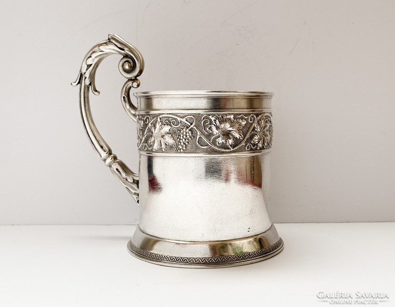 Ornate Russian silver tea cup.