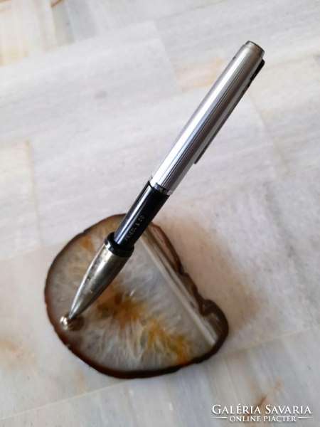 Antique pen holder on desk