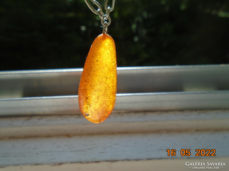 Antique amber pendant with decorative filigree alpaca pendant with hook