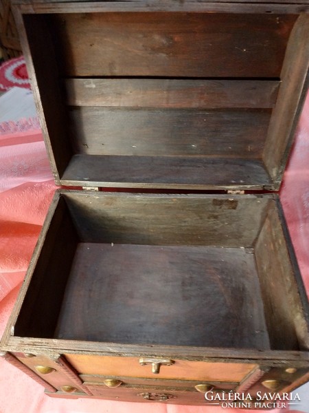 Antique jewelry box in wooden chest