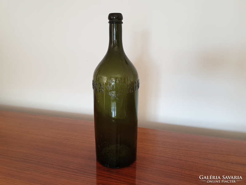 Old bottle circa 1920 Ilona artesian mineral water green bottle with label