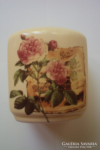 Vintage, butter-colored porcelain salt shaker with rich rose pattern.