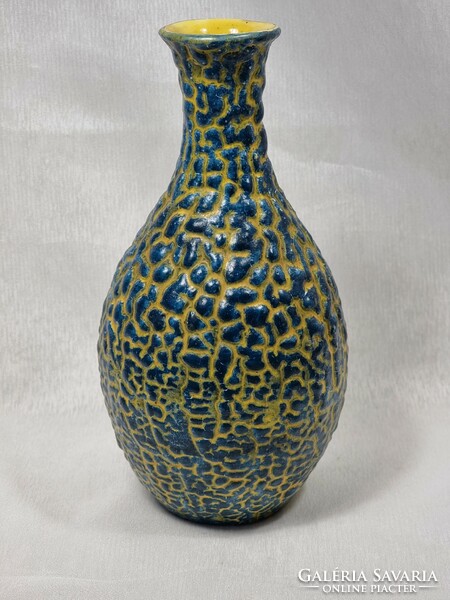 Painted-glazed ceramic vase, with cracked glaze, with the label of a craftsman company, xx.Second half