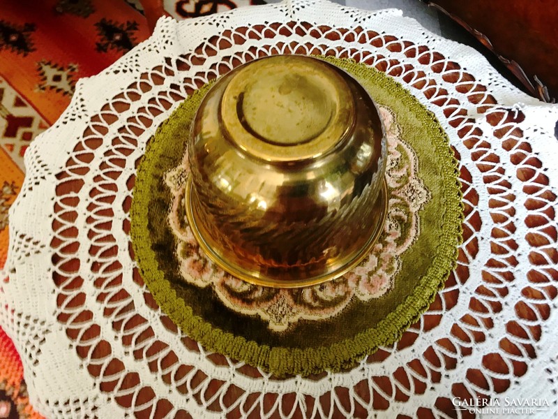 Old brass pot with a special shape and a smaller size