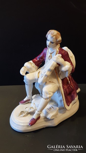 Old porcelain. Baroque, musician, violinist, damaged, a piece of violin broken.