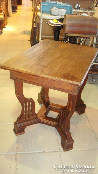 Art Nouveau table 100 years old in good condition.