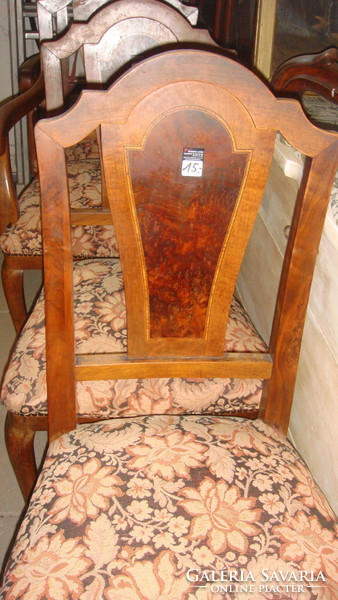 High back two civilian chairs in good condition.