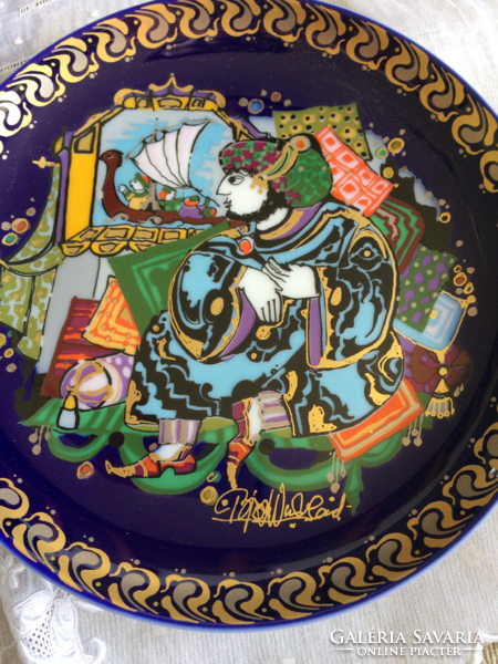 A pair of Bjorn wiinblad decorative plates from the sindbad series, signed by the designer