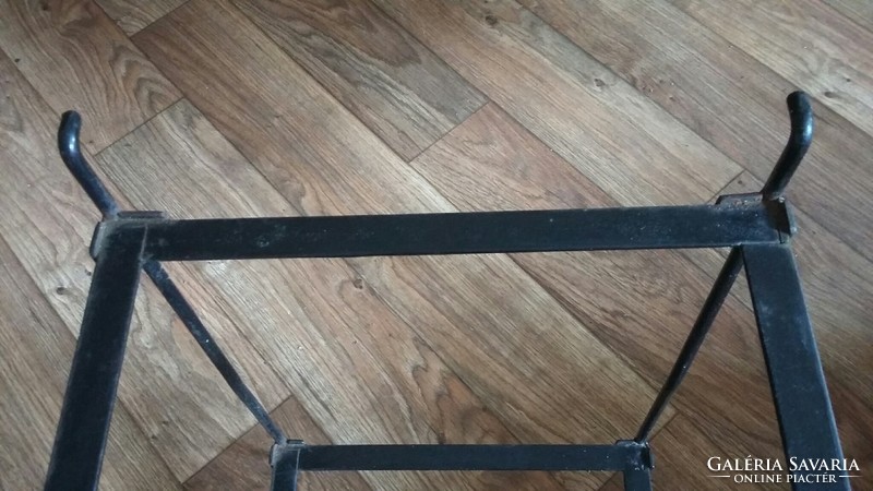 Old used metal table with glass sheets