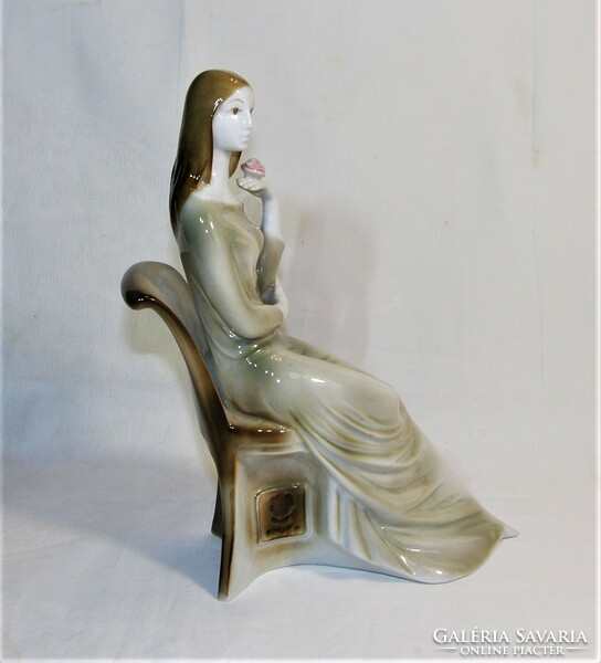 Sitting woman with flowers - old zsolnay porcelain figurine