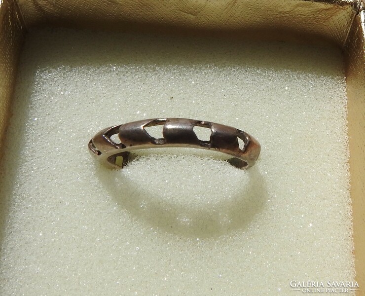 Silver ring with modernist openwork decoration