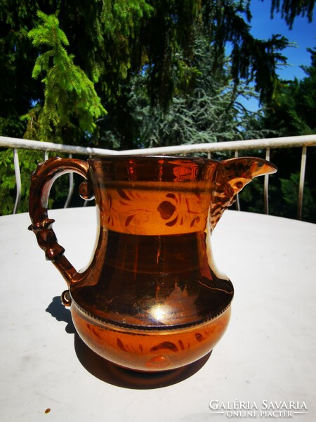Antique faunhead jug