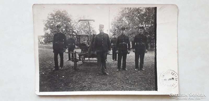 Old postcard with firecracker circa 1910 fire truck firefighter photo photo