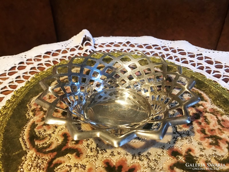 A bowl offering a wonderful, silver-plated, pierced, marked delicacy or sugar cubes