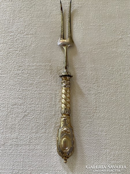 Large baroque gilded silver meat fork