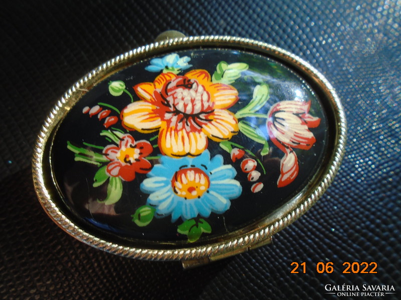 Enameled oval pill box with hand-painted bouquet of flowers with ornate chiseled patterns