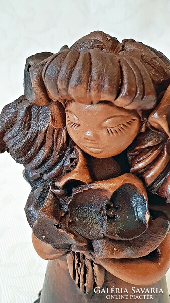 The work of György Újpál. Beautiful, old, brown-glazed, ceramic little girl with flowers. 17.5 cm. Significance.