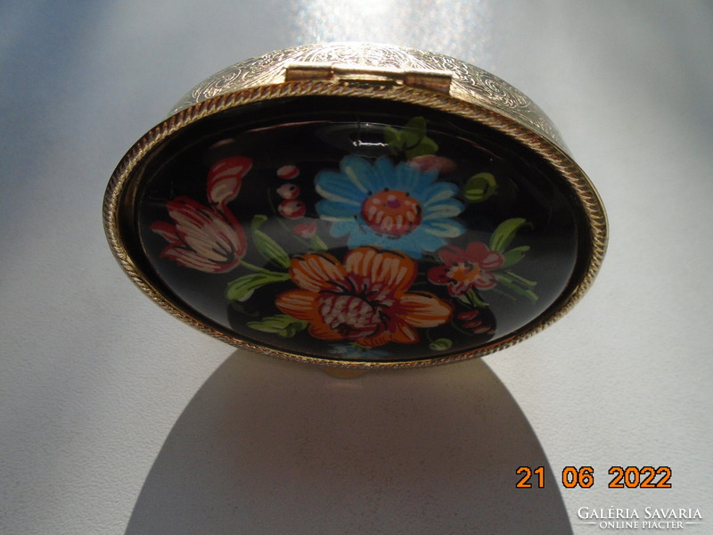 Enameled oval pill box with hand-painted bouquet of flowers with ornate chiseled patterns