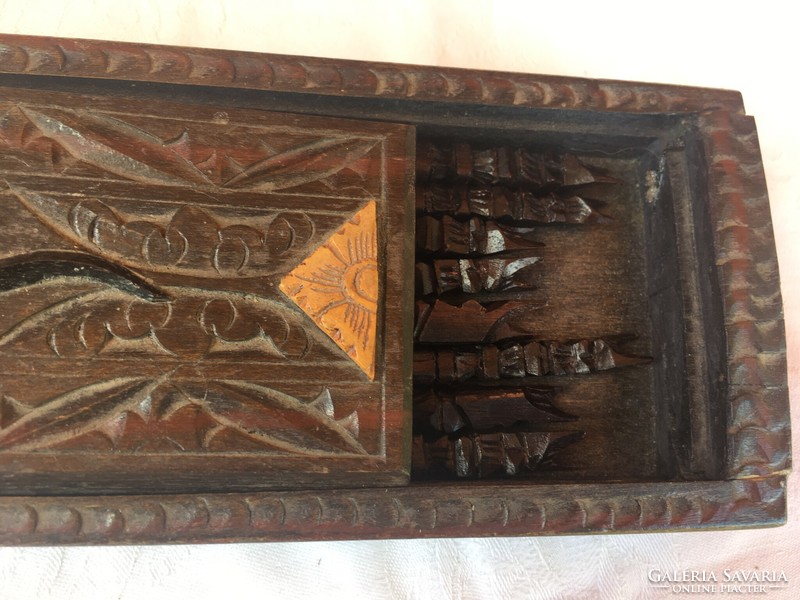 4 pairs of chopsticks in an Indonesian hand-carved box made of probably leaves