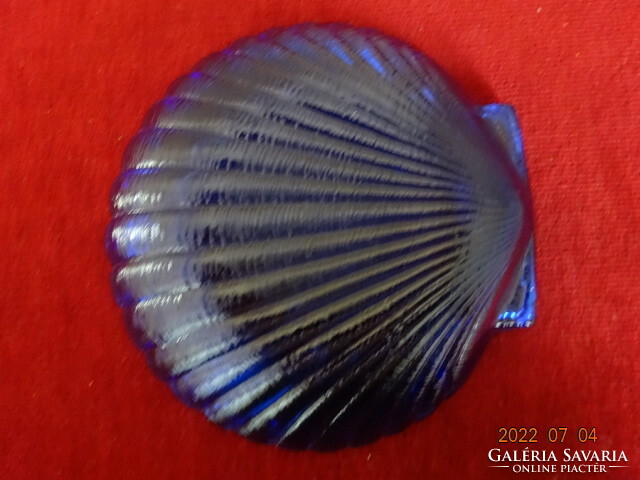 Shell-shaped cobalt blue glass bowl. He has! Jokai.