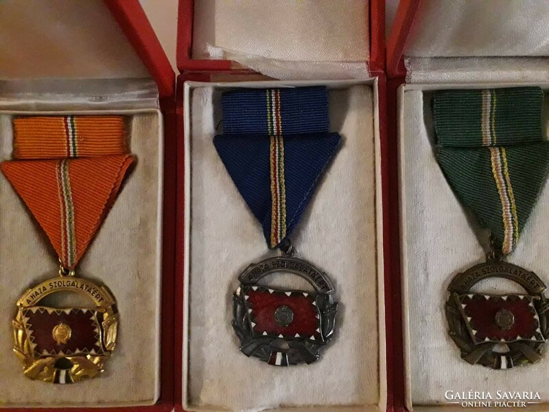 Gold, silver, bronze grades of the Hungarian People's Republic Medal of Merit for Service to the Homeland on original ribbon