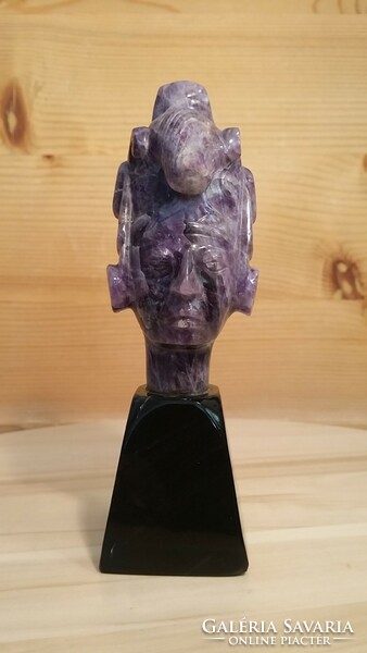 Amethyst Aztec head on black obsidian pedestal