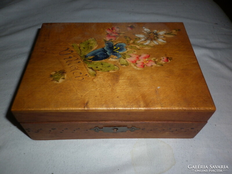 Old wooden box painted with floral pattern