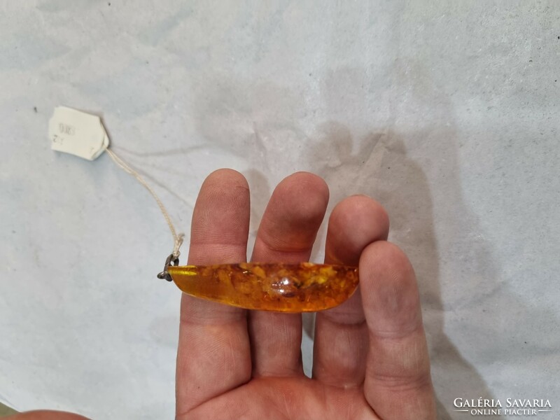 Old amber pendant