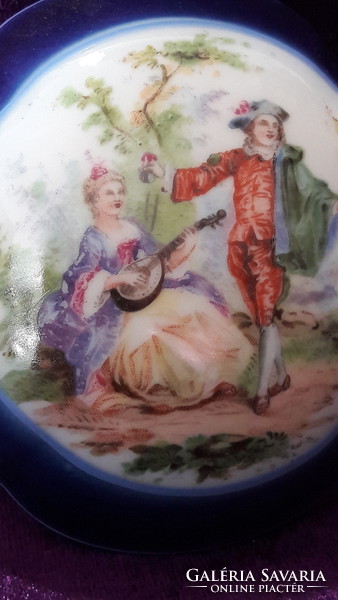 Romantic scene with porcelain box and box