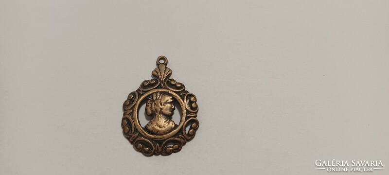 Antique copper or bronze pendant