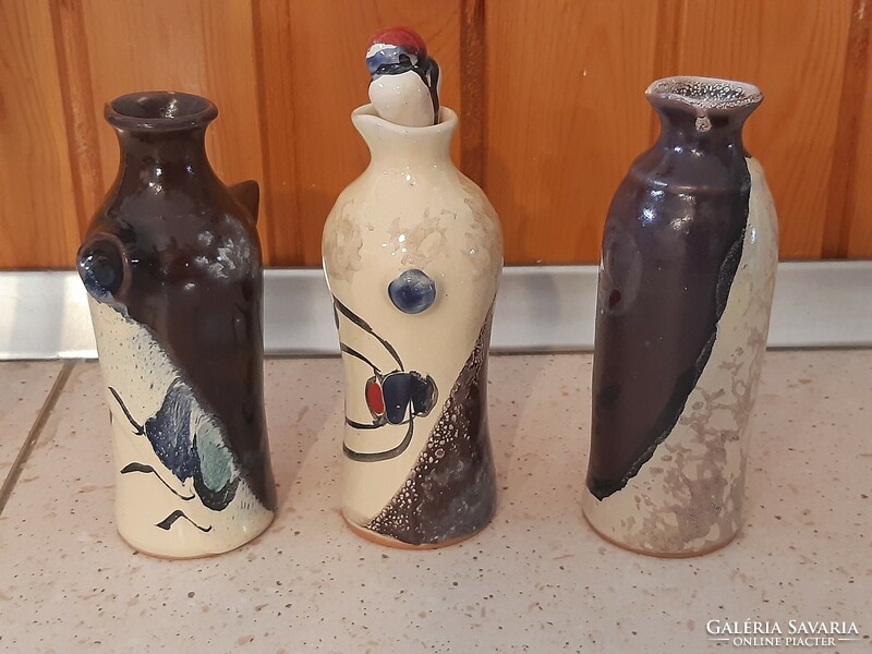 3 figural vases in the style of Joan Miro.