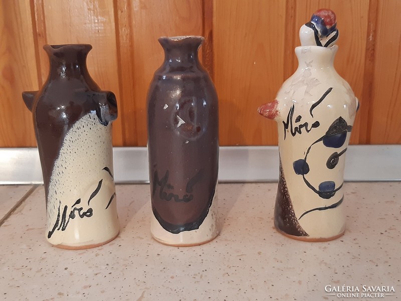 3 figural vases in the style of Joan Miro.