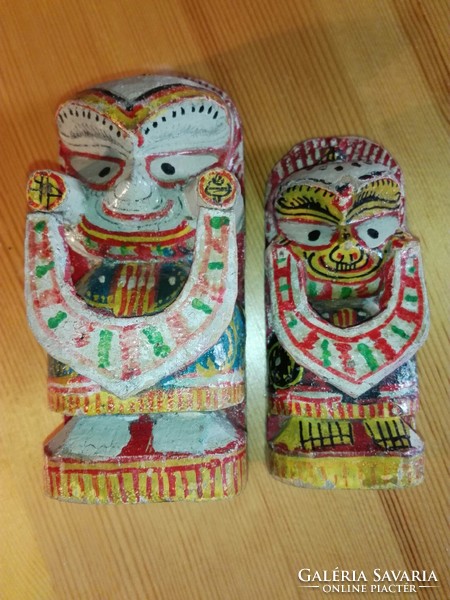Carved and painted totem.