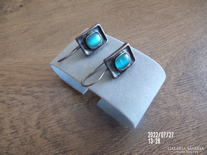 Craftsman silver earrings with blue stone